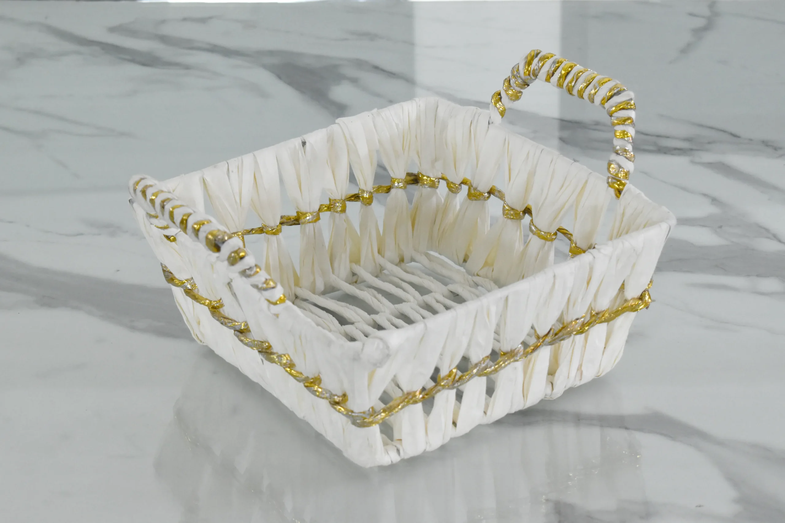 Square decorative woven basket crafted from white paper rope and metal materials.