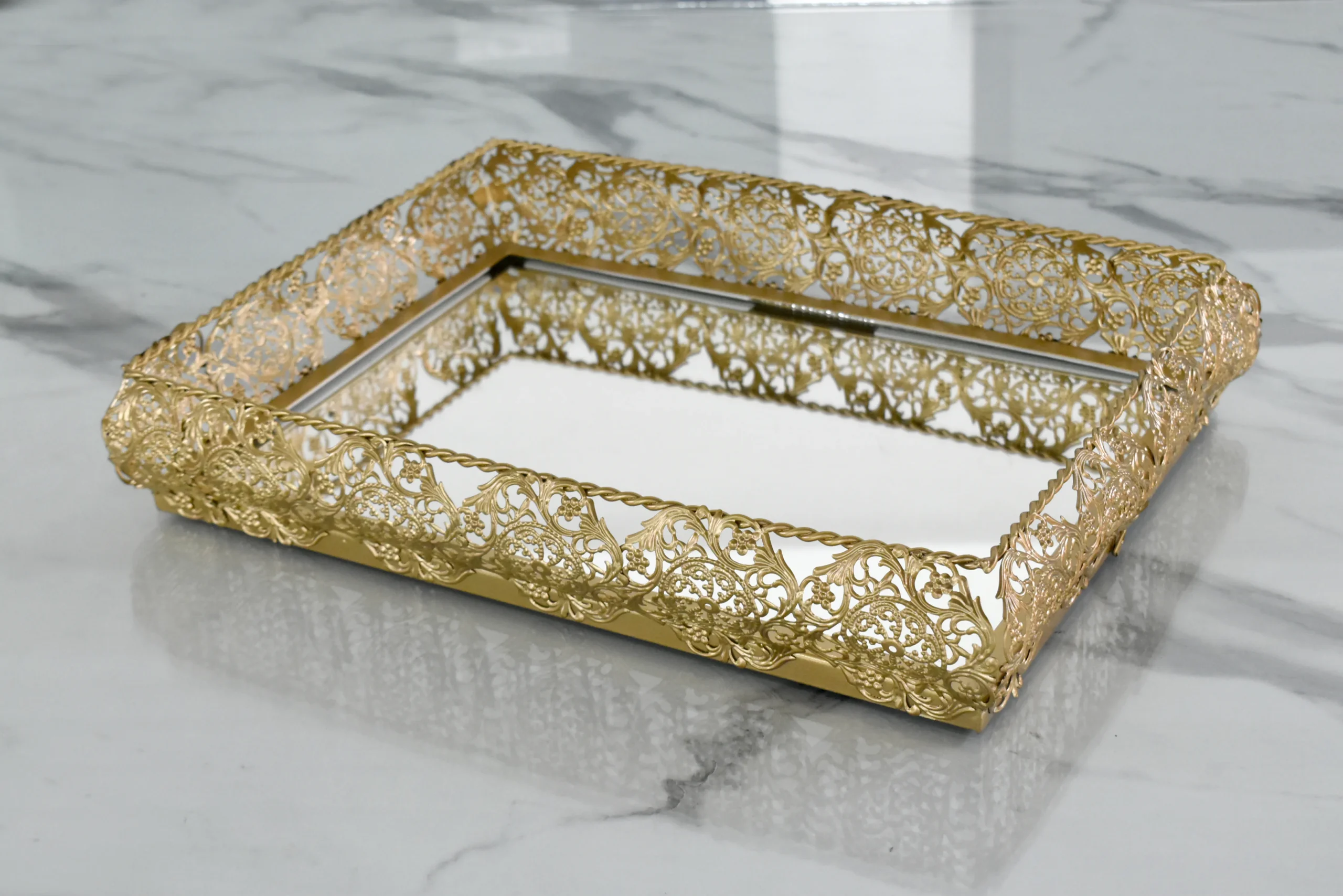 Festive gold decorative tray arranged for Diwali gift hampers and auspicious Dhanteras pooja celebrations.
