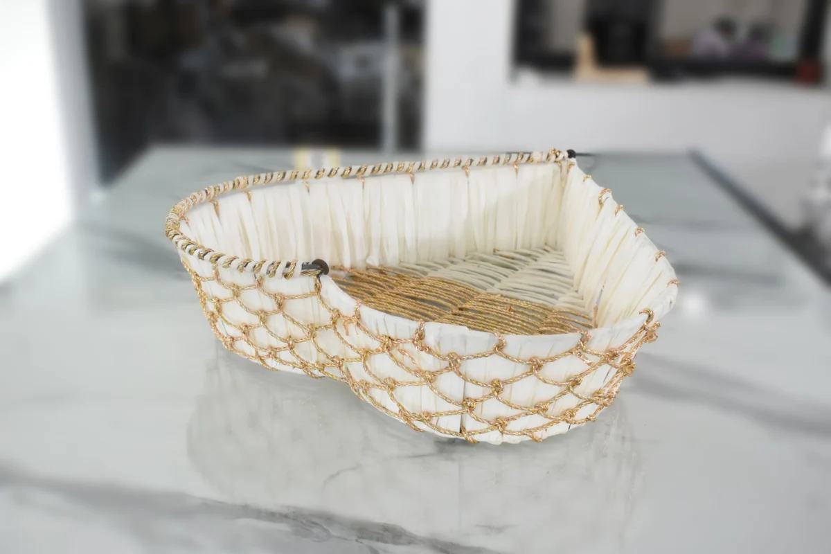 Heart-shaped white and gold basket styled for luxury wedding return gifts and shaadi trousseau hampers.