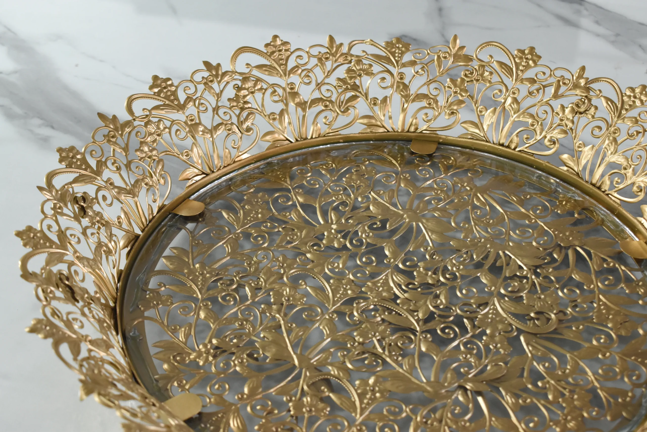 Premium gold-finished round metal tray curated for corporate festive giveaways and executive client hampers.