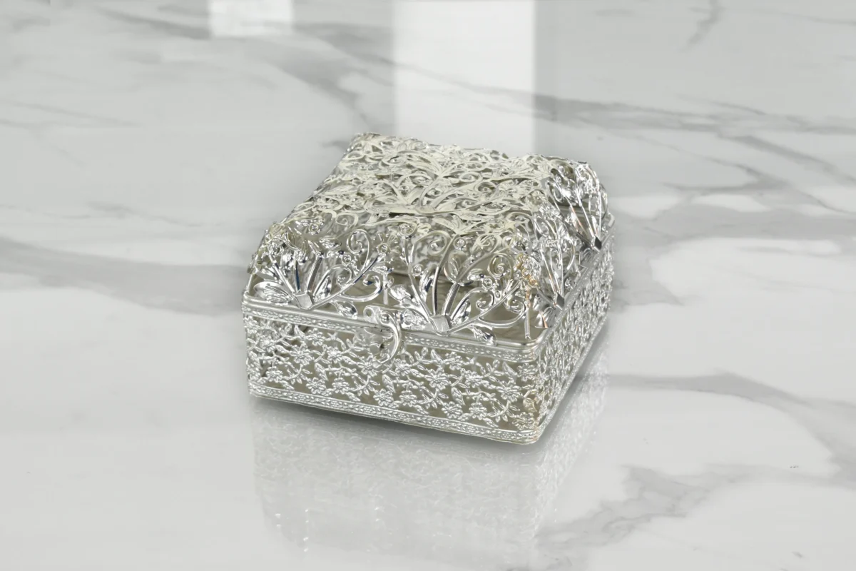 Premium silver-plated filigree hamper basket curated for corporate Diwali gifts and executive client sets.