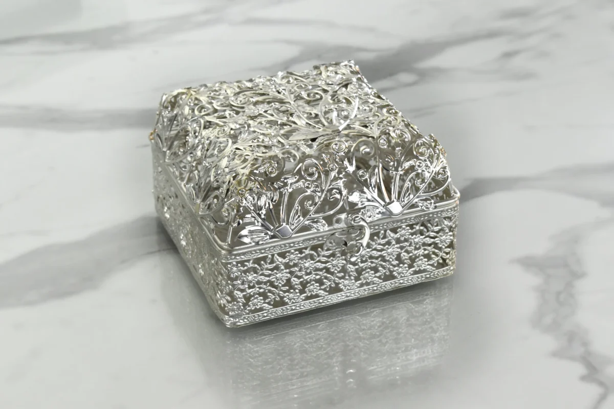 Festive silver-plated decorative basket arranged for Diwali gifting and auspicious Dhanteras pooja celebrations.