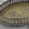 Antique-finished embossed metal decorative oval tray with raised filigree rim for elegant home styling