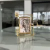 Elegant iron wire photo frame styled inside a luxury wedding return gift hamper for a traditional shaadi.