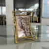 Geometric metal picture frame ideal for Griha Pravesh housewarming gift sets and family celebrations.