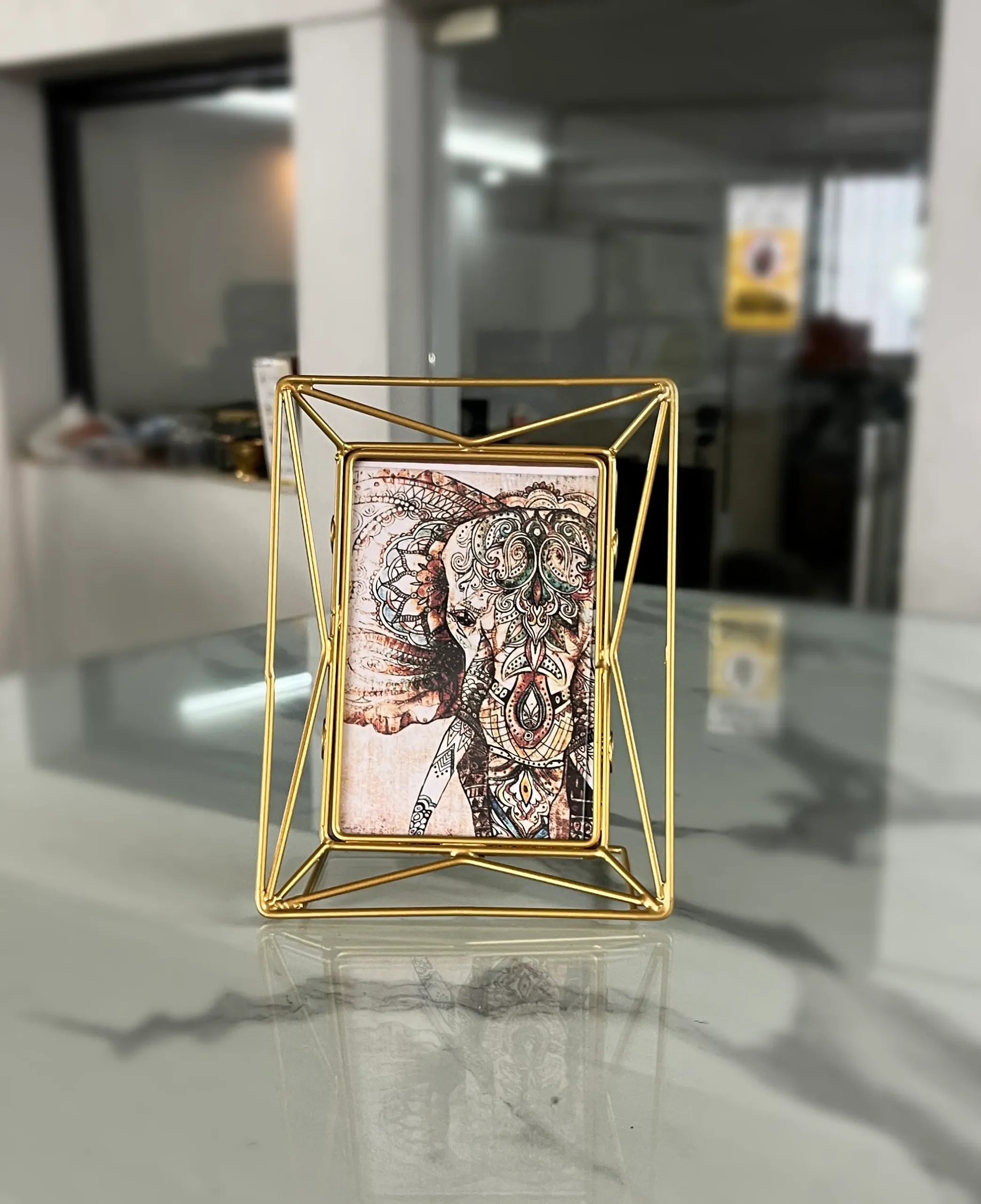 Stylish iron photo frame presented as a premium corporate gift for employee appreciation and New Year hampers.