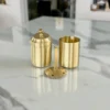 Polished brass filter coffee maker arranged in an opulent Diwali and Dhanteras festive gift hamper.