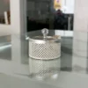 Elegant German silver mesh containers styled as luxury wedding return gifts for a traditional shaadi ceremony.
