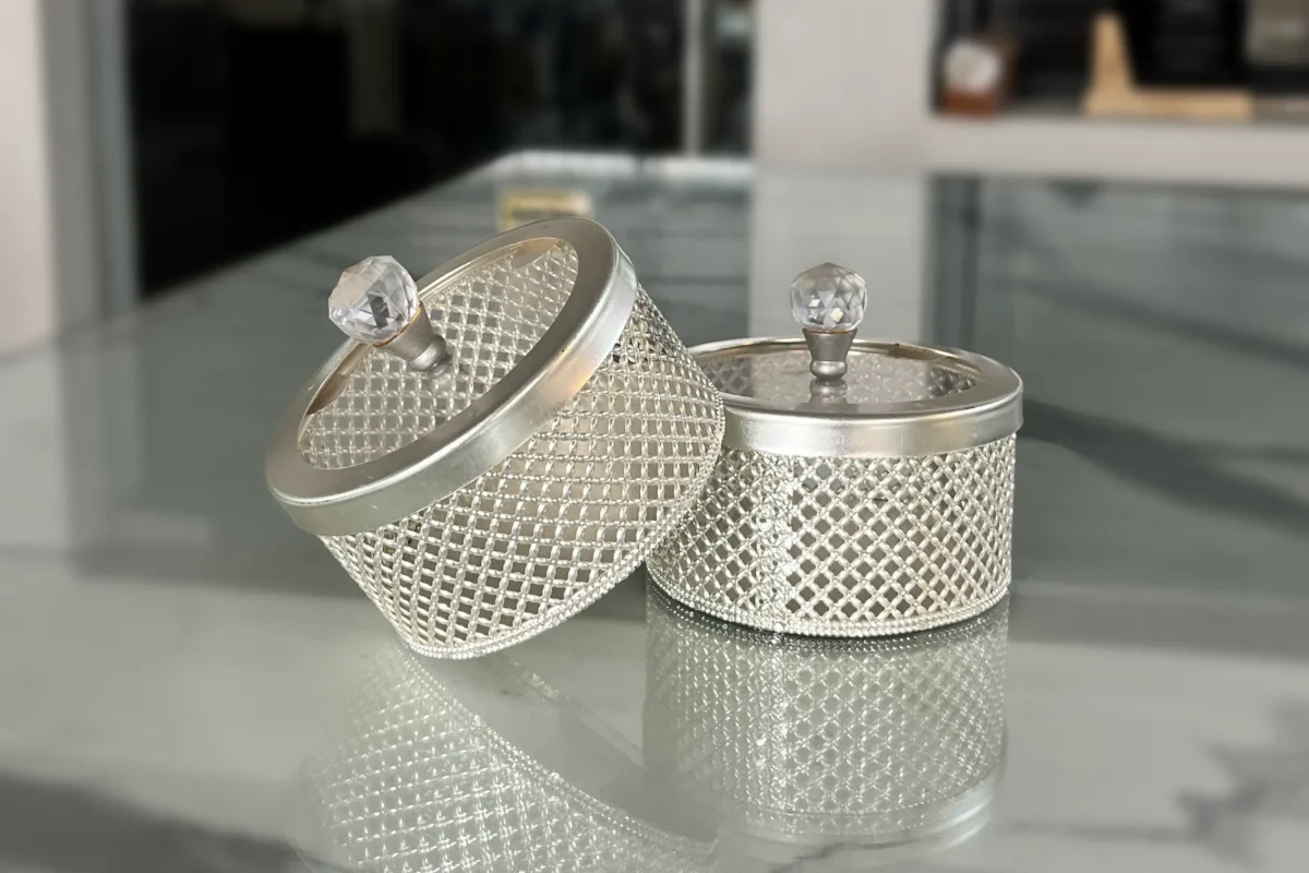 Polished German silver festive boxes arranged for Diwali dry fruit hampers and Dhanteras celebrations.