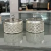Elegant German silver mesh containers styled as luxury wedding return gifts for a traditional shaadi ceremony.