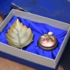 Personalized gift hamper from house2home, made to your requirements with custom branding on brass, aluminium or metal handicraft for corporate gifting.
